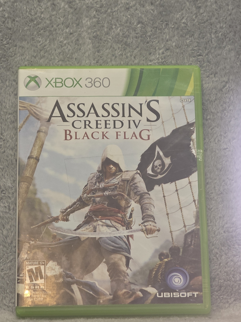 Assassin's Creed IV: Black Flag (Xbox 360) - Green Case by Ubisoft